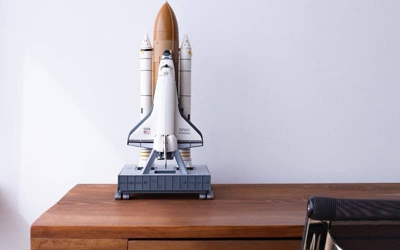 white and brown space ship toy
